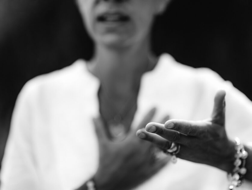 Spiritual Healer Expressing Honesty with her Hands